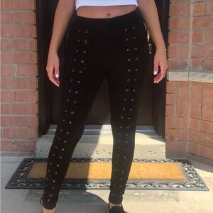 Black leggings with gold detail